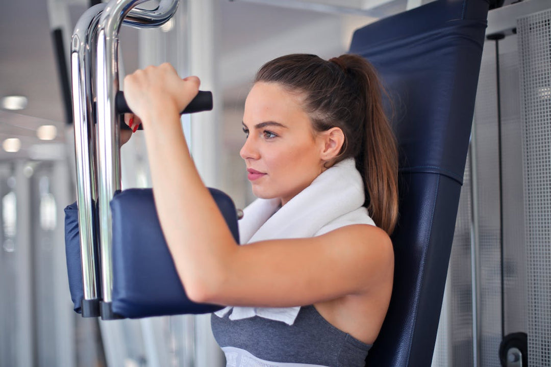 woman using gym equipment