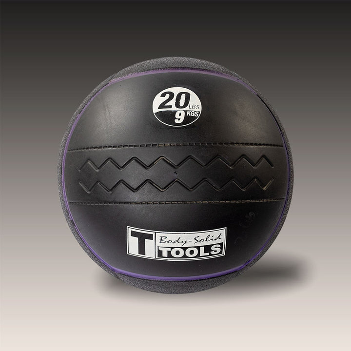 Body-Solid Tools 20 lb heavy rubber medicine ball with purple weight indicator.