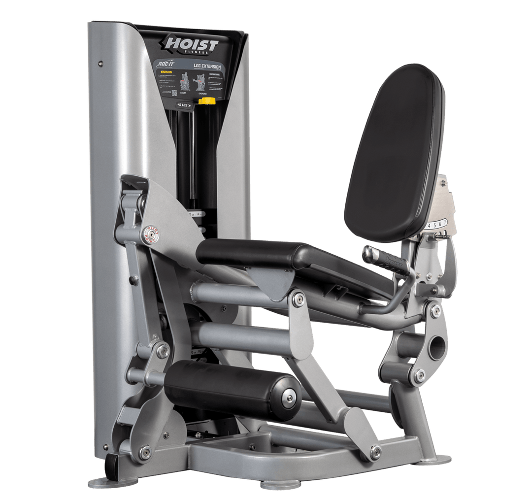 Hoist leg extension machine with adjustable seat, padded leg rollers, and weight stack system for quadriceps strengthening exercises