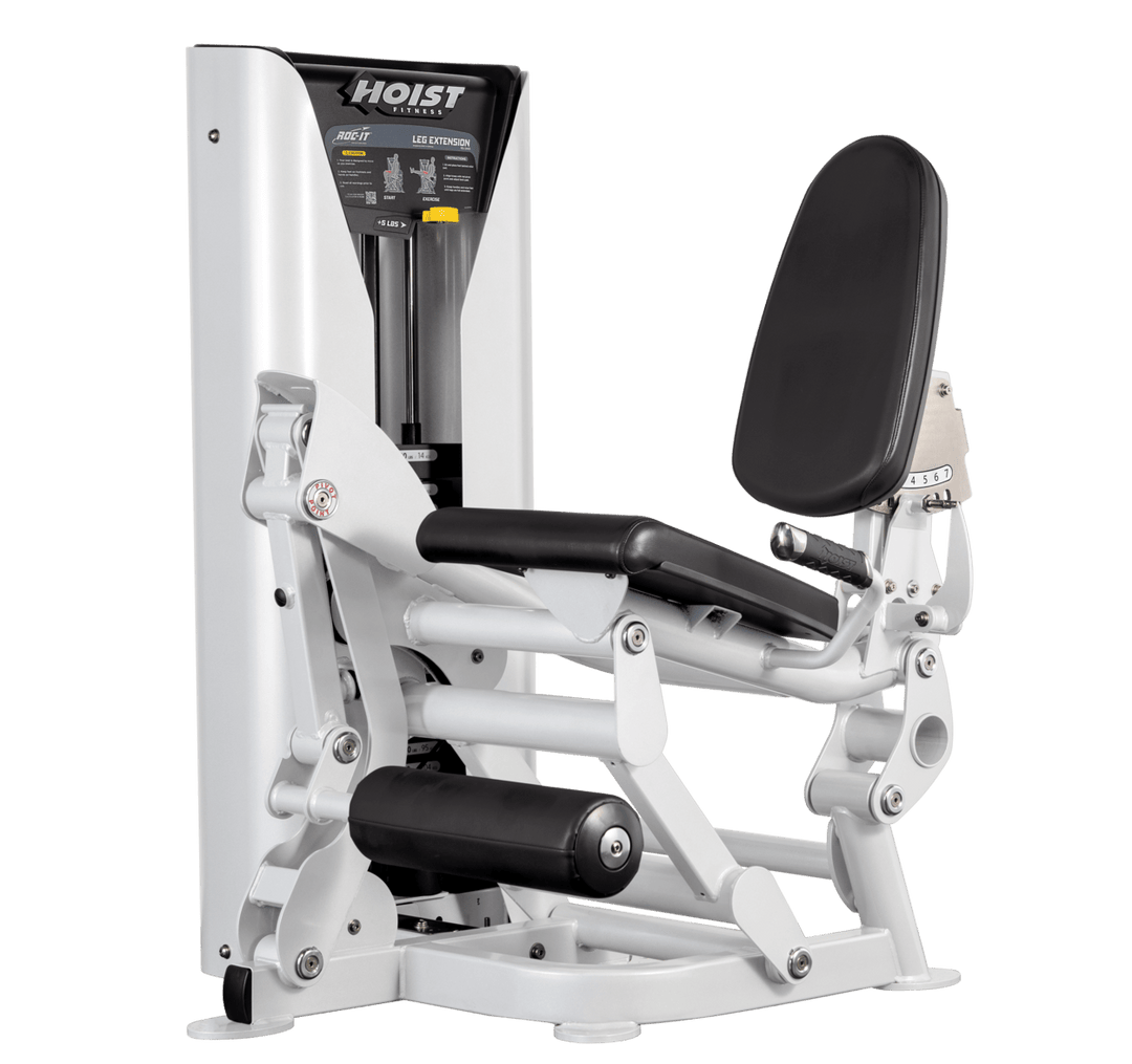 Hoist leg extension machine with adjustable seat, padded leg rollers, and weight stack system for quadriceps strengthening exercises