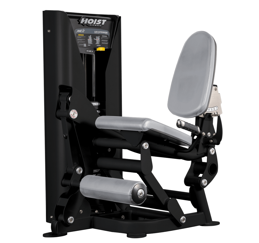 Hoist leg extension machine with adjustable seat, padded leg rollers, and weight stack system for quadriceps strengthening exercises