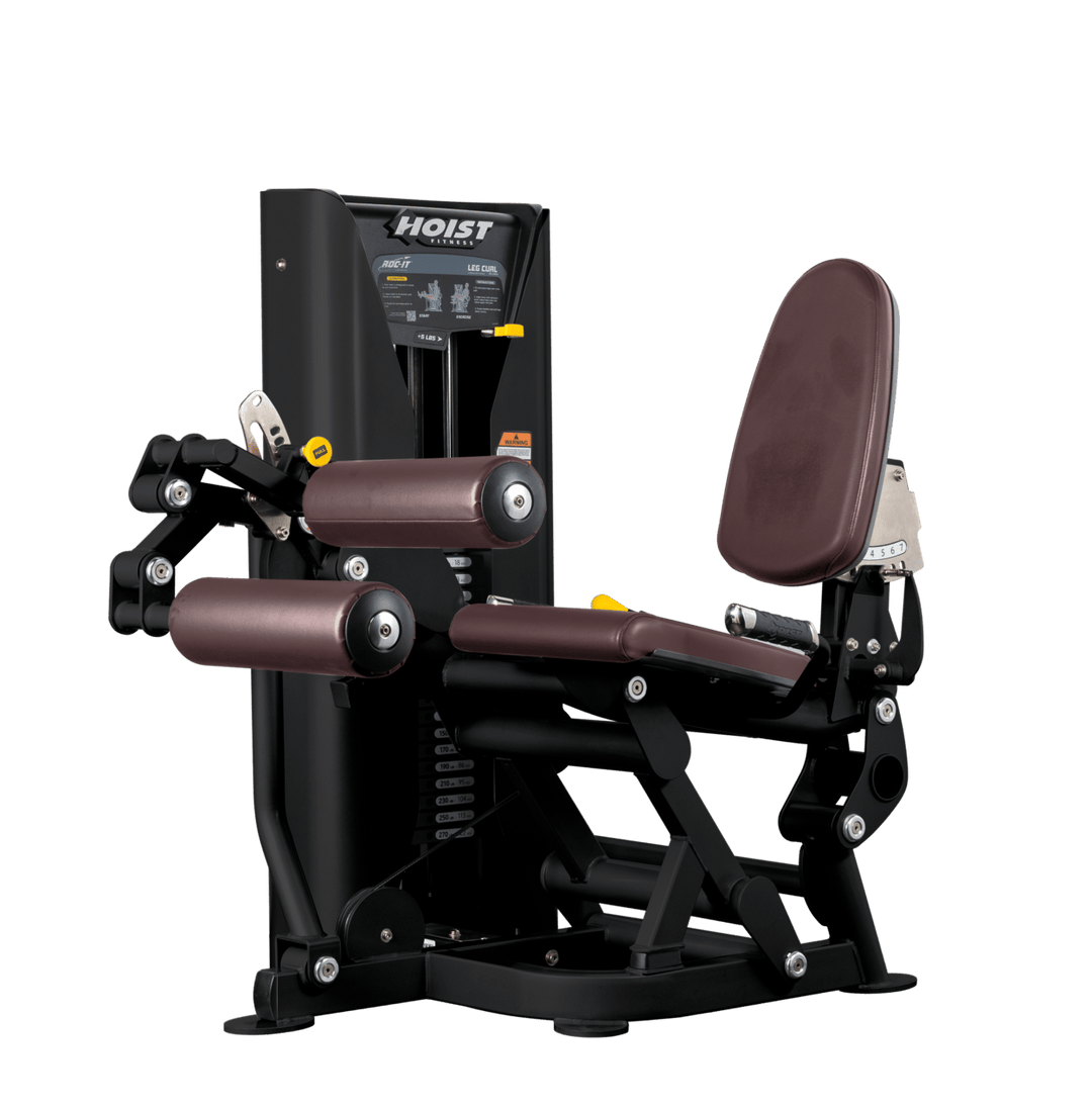 Hoist leg press machine with adjustable seat, padded leg rollers, and selectorized weight stack for lower body strength training