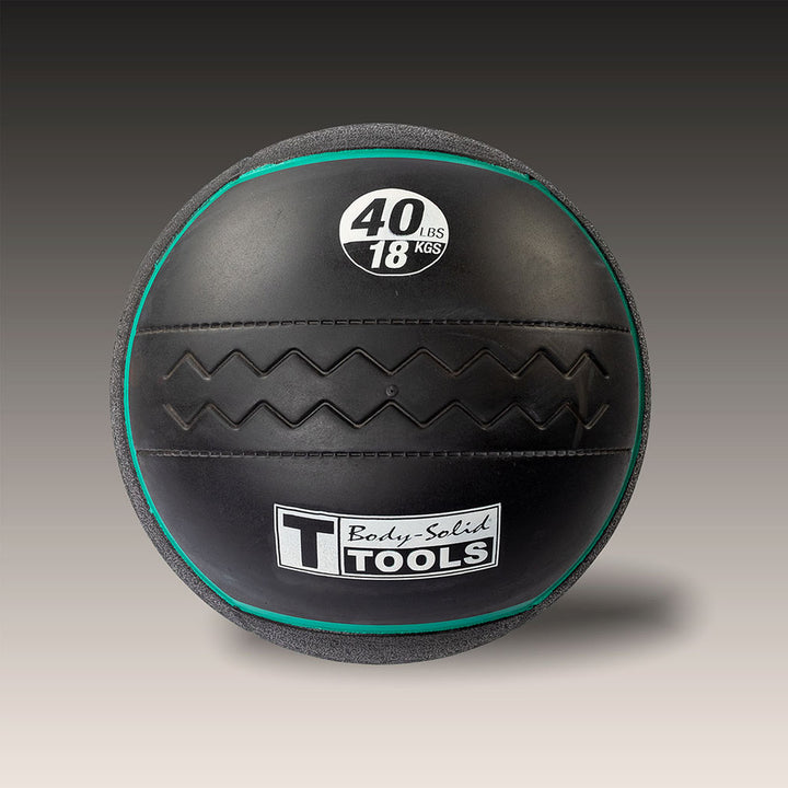 Body-Solid Tools 40 lb heavy rubber medicine ball with green weight indicator.