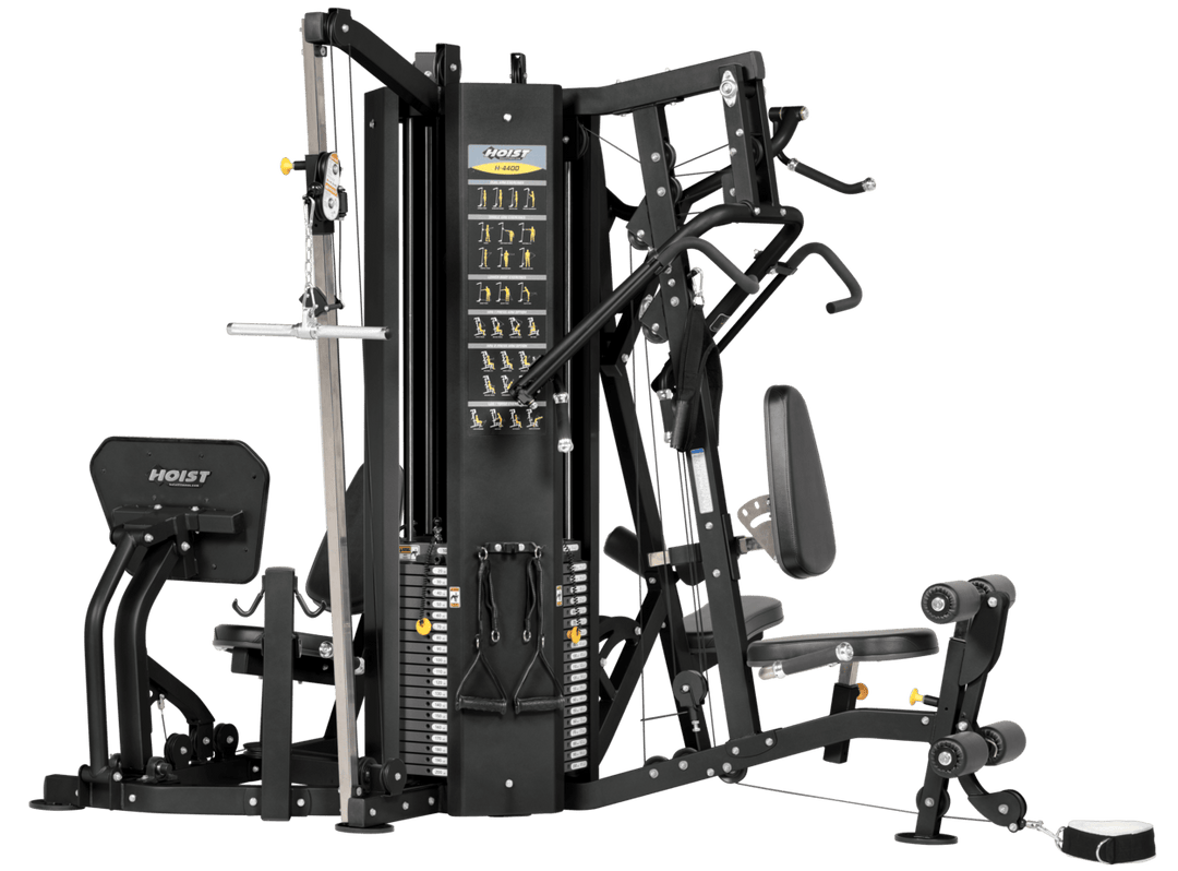 4 stack multi gym front view showing central weight stacks and multi station strength training configuration