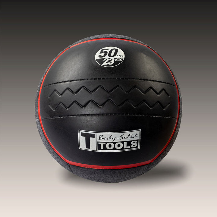 Body-Solid Tools 50 lb heavy rubber medicine ball with red weight indicator.