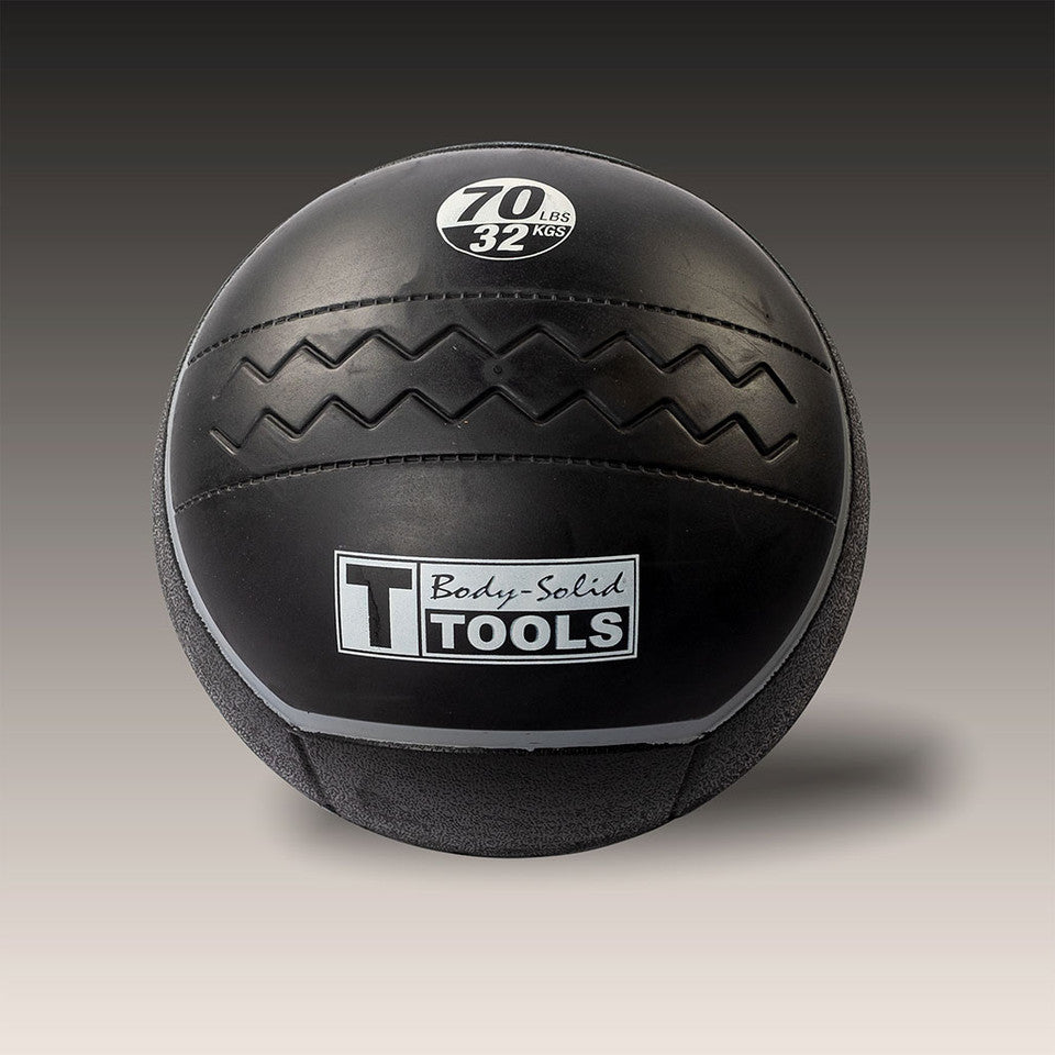 Body-Solid Tools 70 lb heavy rubber medicine ball with gray weight indicator.