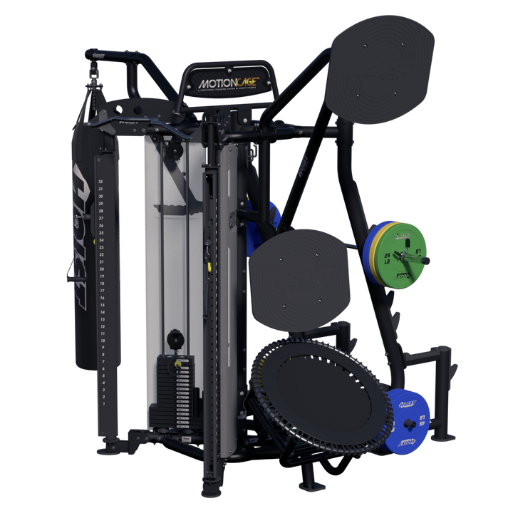 black frame Motion Cage Studio Package 5 with rebounder attachment, plate storage, and conditioning accessories