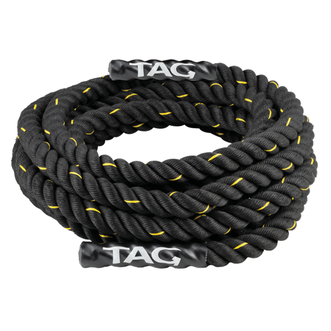 Black PolyDacron battle rope coiled with yellow accents and TAG heat shrink ends