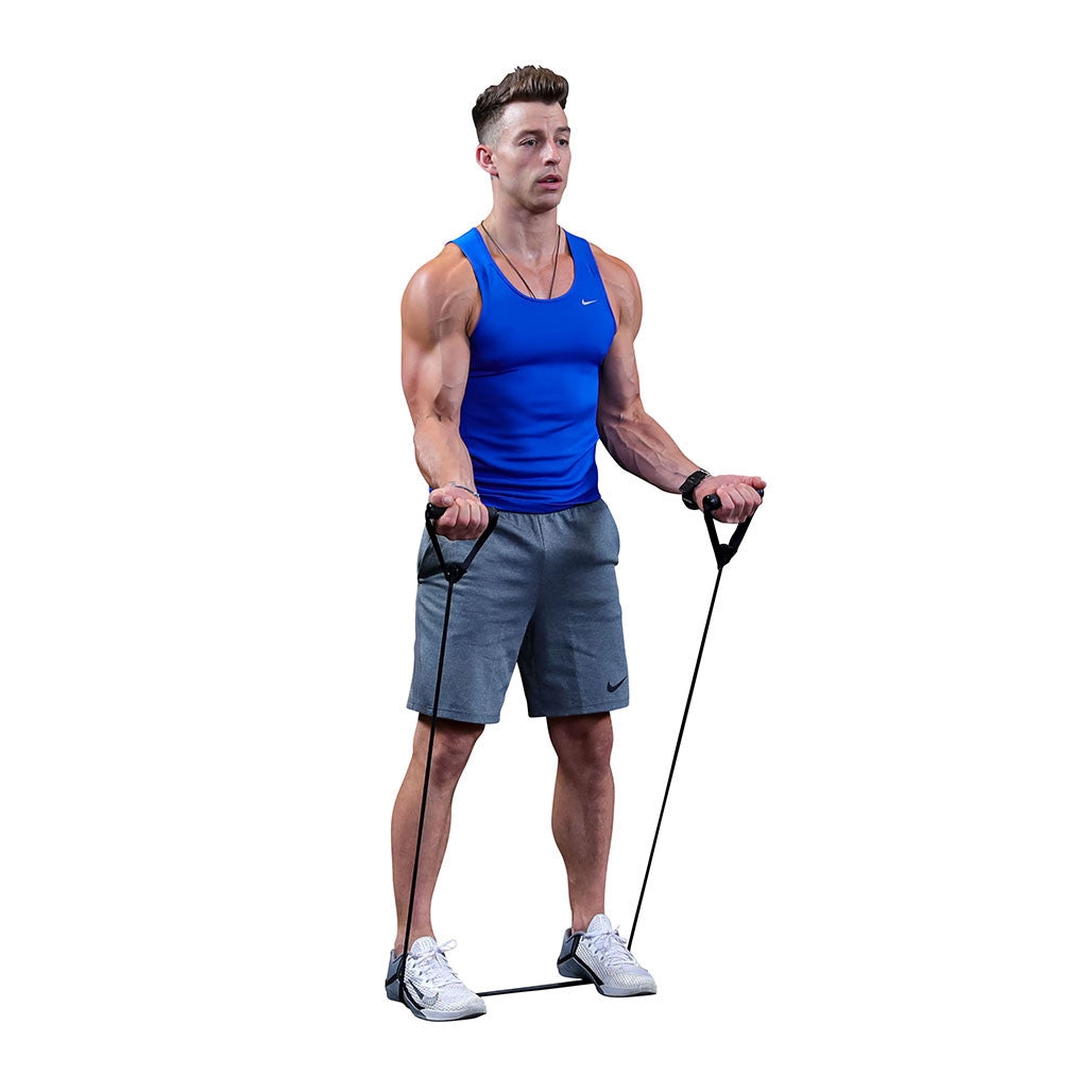 Man performing a standing biceps exercise with a Body-Solid resistance tube
