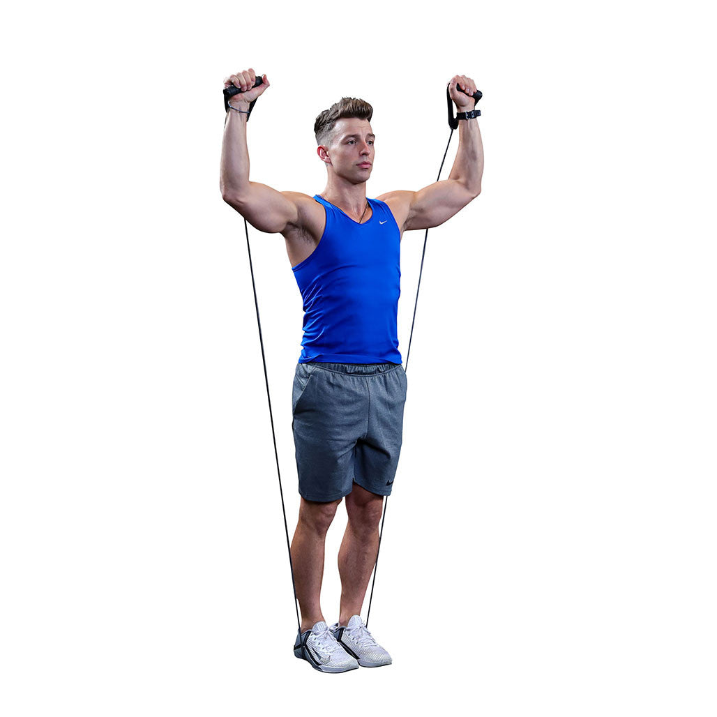 Man performing a standing overhead exercise with a Body-Solid resistance tube