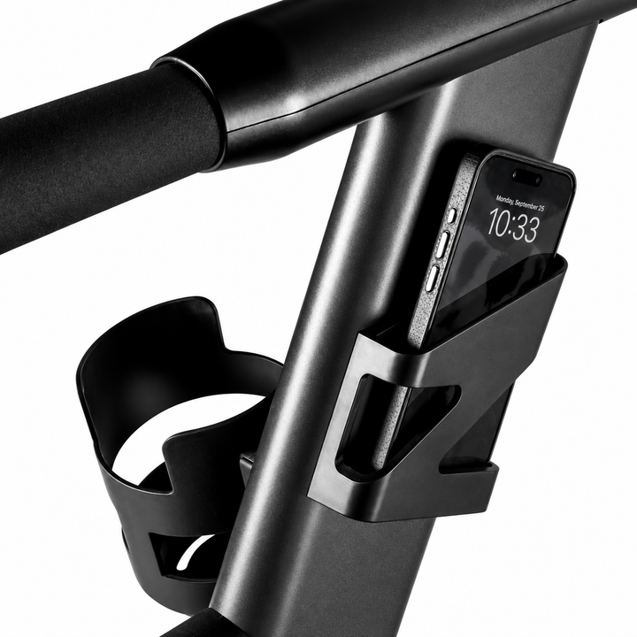 Integrated phone and tablet holder with cup holder on the CENTR curved treadmill for convenient workout access.