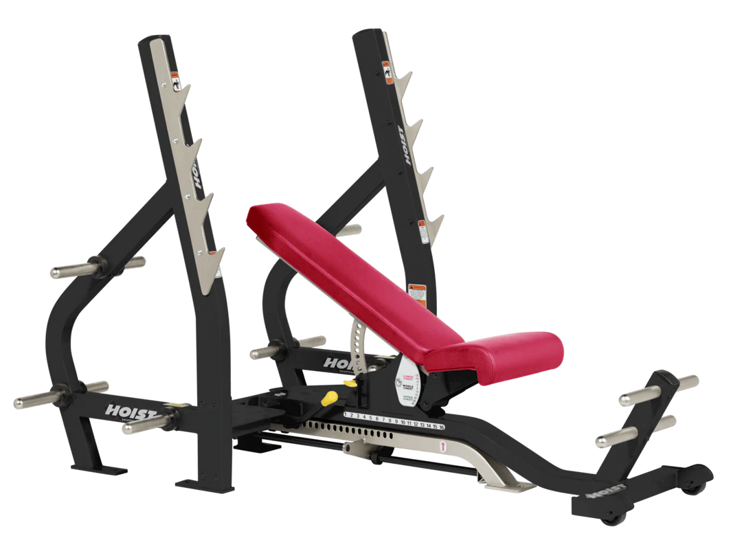 American beauty HOIST 3-way Olympic bench with adjustable incline decline back pad and barbell rack supports for commercial gym use