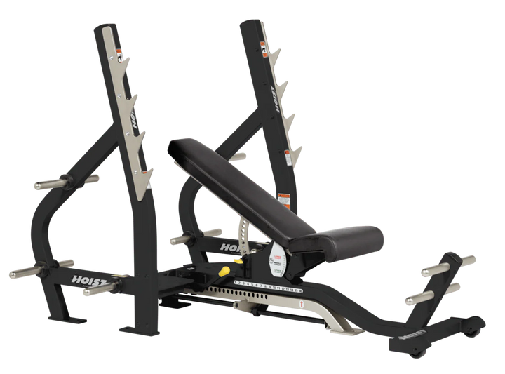black HOIST 3-way Olympic bench with adjustable incline decline back pad and barbell rack supports for commercial gym use