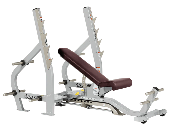 Burgundy Platinum HOIST 3-way Olympic bench with adjustable incline decline back pad and barbell rack supports for commercial gym use