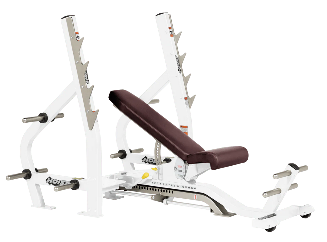 Burgundy White HOIST 3-way Olympic bench with adjustable incline decline back pad and barbell rack supports for commercial gym use