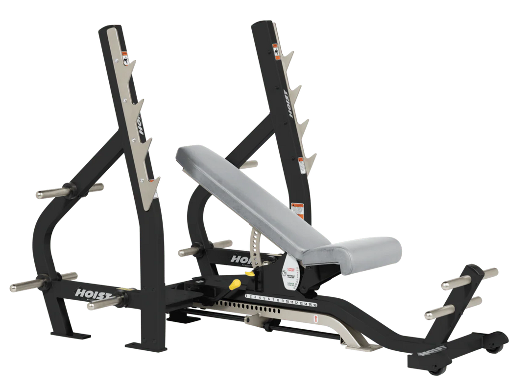 Dove Gray HOIST 3-way Olympic bench with adjustable incline decline back pad and barbell rack supports for commercial gym use