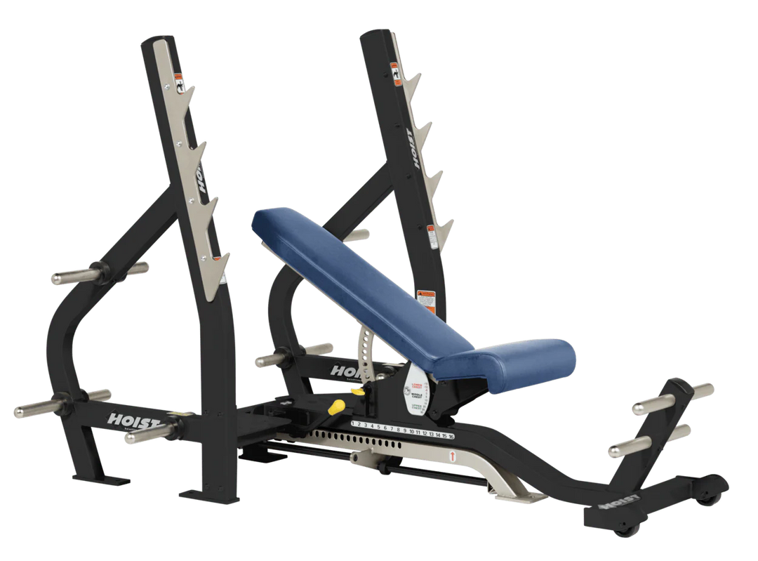 Royal Blue HOIST 3-way Olympic bench with adjustable incline decline back pad and barbell rack supports for commercial gym use