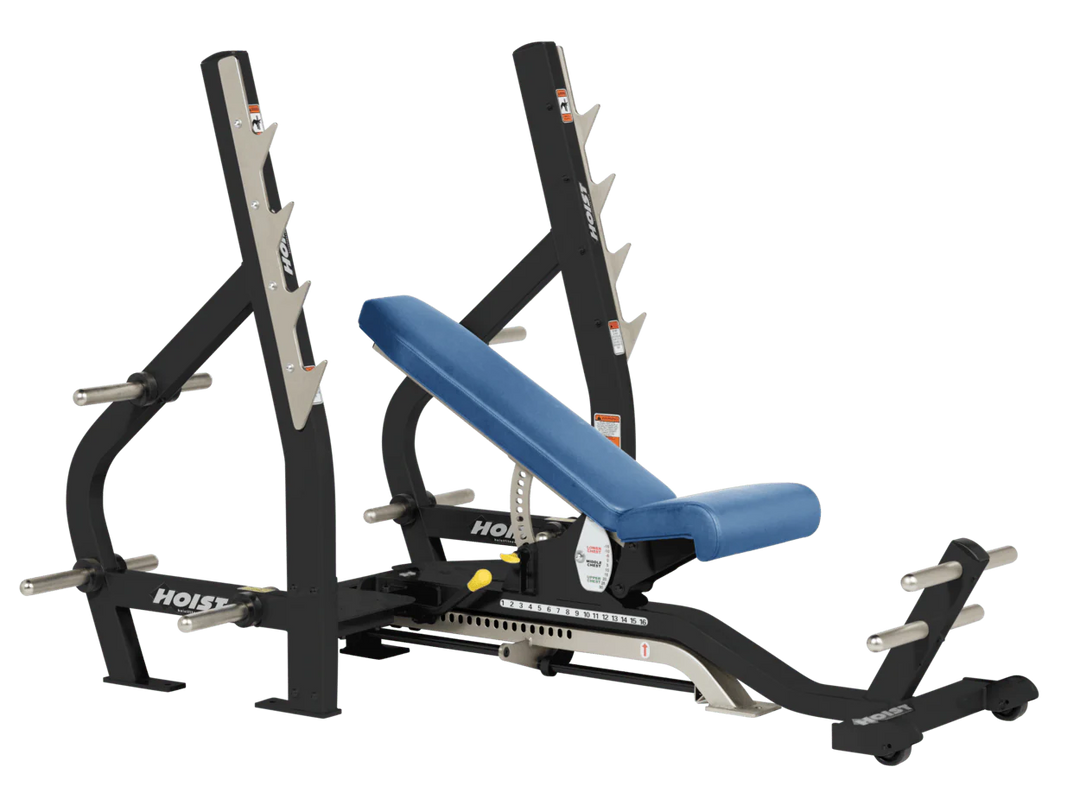 Sky Blue HOIST 3-way Olympic bench with adjustable incline decline back pad and barbell rack supports for commercial gym use
