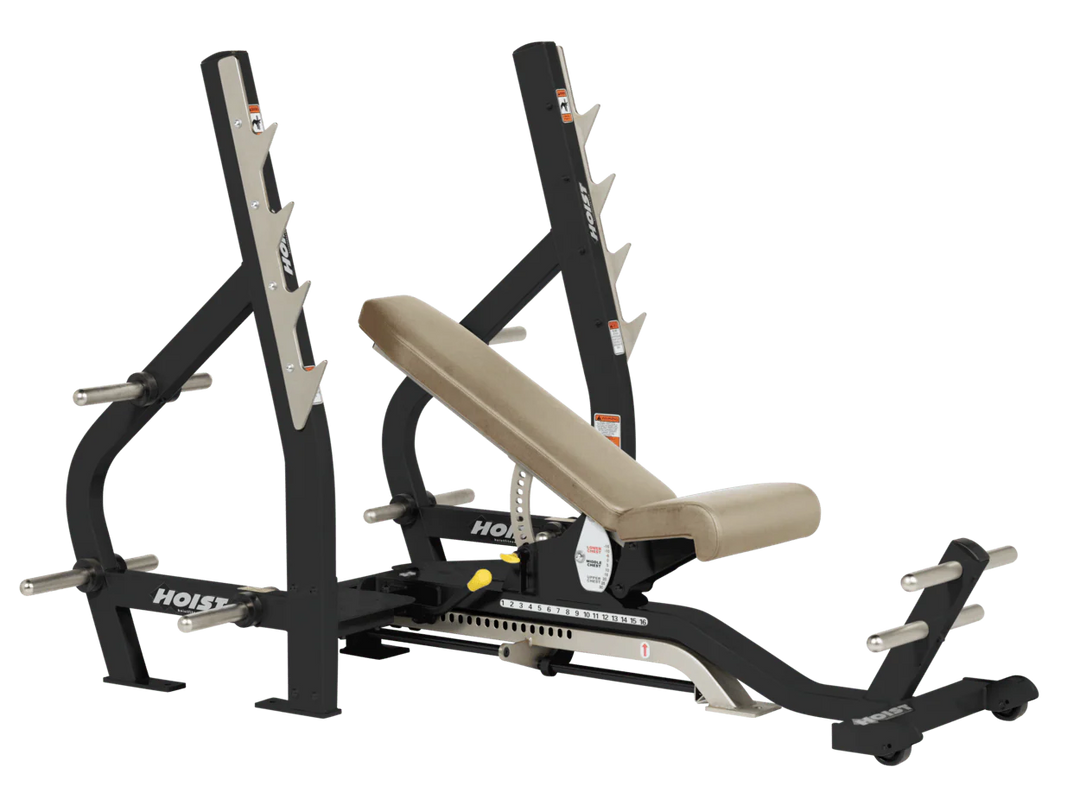 Suede HOIST 3-way Olympic bench with adjustable incline decline back pad and barbell rack supports for commercial gym use