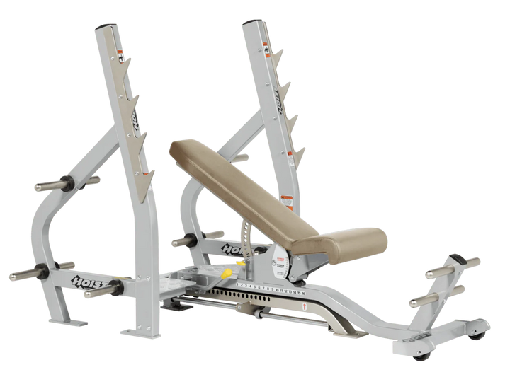 Suede Platinum HOIST 3-way Olympic bench with adjustable incline decline back pad and barbell rack supports for commercial gym use