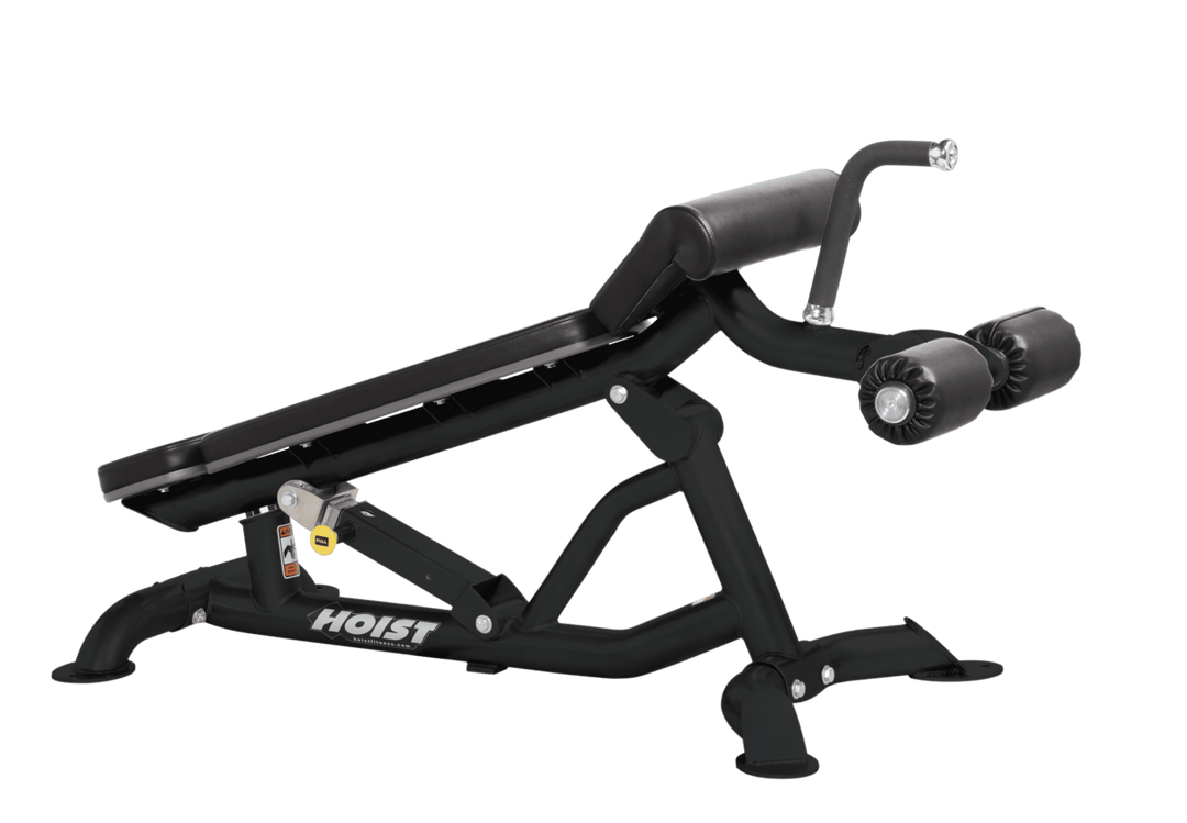 Hoist super flat decline bench with leg hold-down rollers and black padded seat for strength training exercises