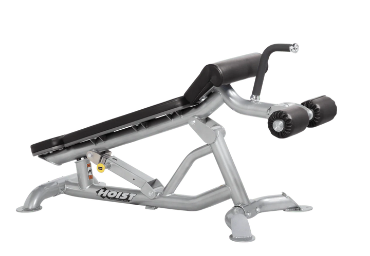 Hoist super flat decline bench with leg hold-down rollers and platinum black padded seat for strength training exercises