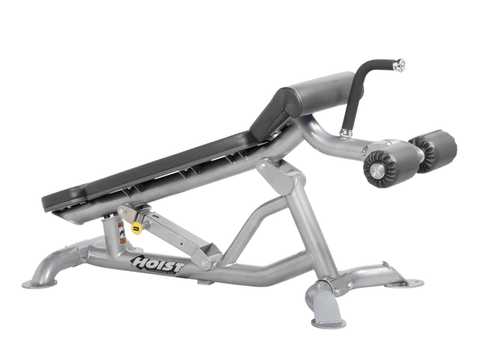 Hoist super flat decline bench with leg hold-down rollers and platinum slate grey padded seat for strength training exercises