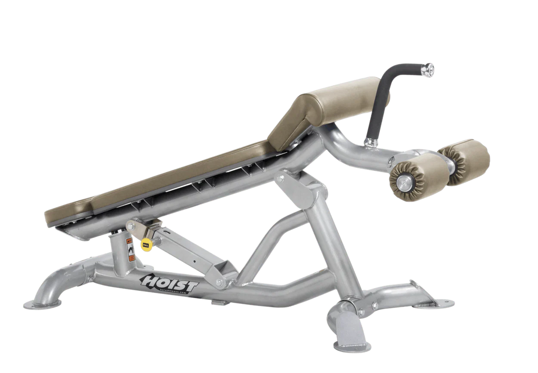 Hoist super flat decline bench with leg hold-down rollers and platinum suede padded seat for strength training exercises