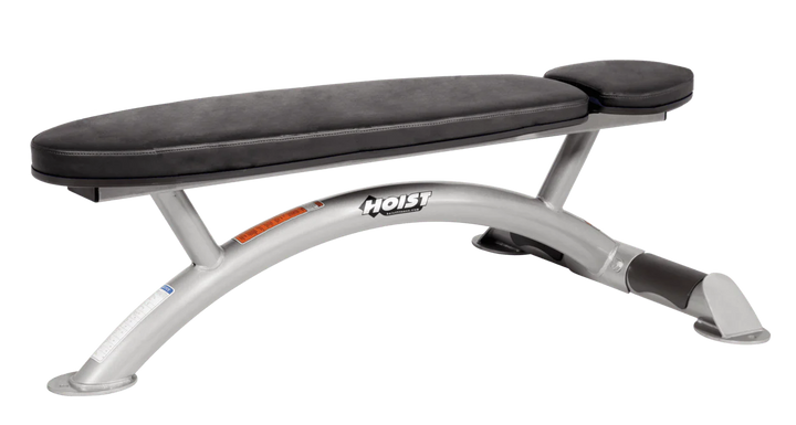 Hoist commercial flat bench with platinum black padding and curved steel frame for weightlifting and strength training