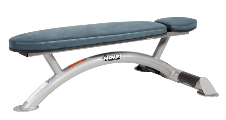 Hoist commercial flat bench with platinum blue ridge padding and curved steel frame for weightlifting and strength training