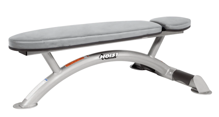 Hoist commercial flat bench with platinum dove grey padding and curved steel frame for weightlifting and strength training