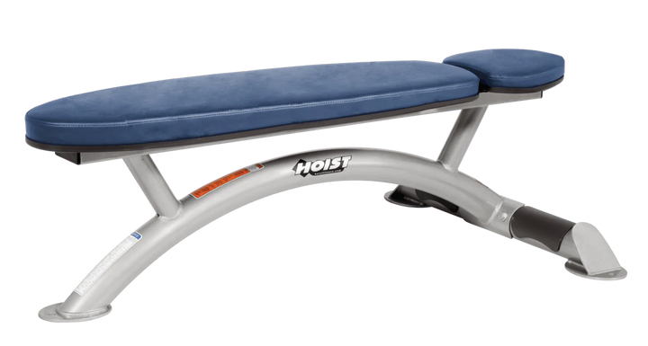 Hoist commercial flat bench with platinum royal blue padding and curved steel frame for weightlifting and strength training