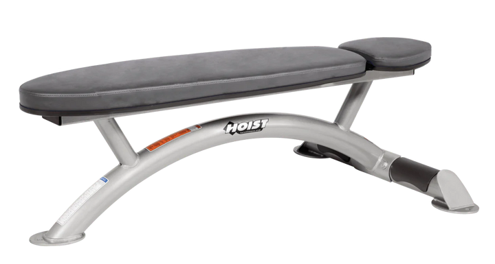 Hoist commercial flat bench with platinum slate grey padding and curved steel frame for weightlifting and strength training