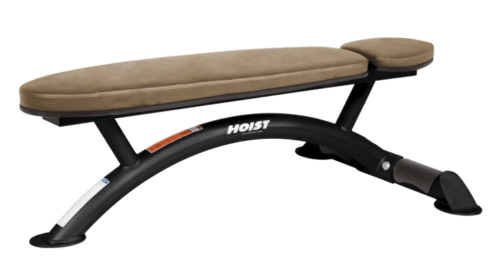 Hoist commercial flat bench with wheat padding and curved steel frame for weightlifting and strength training