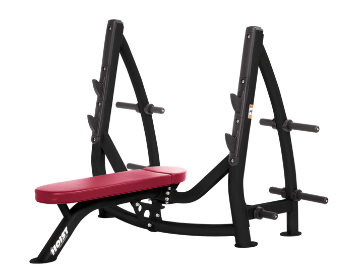 Hoist american beauty commercial Olympic flat bench with built-in weight plate storage and barbell rack for strength training
