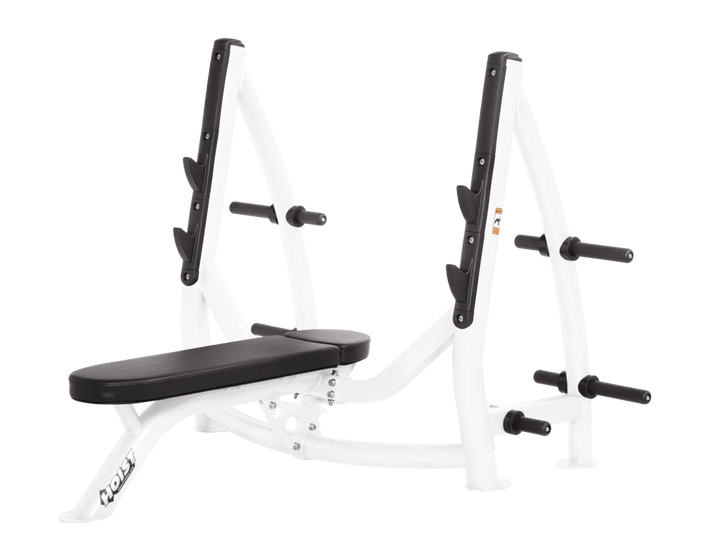 Hoist white black commercial Olympic flat bench with built-in weight plate storage and barbell rack for strength training
