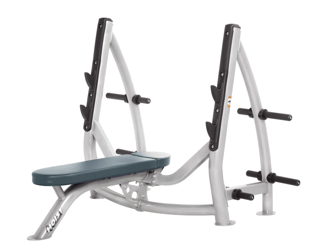 Hoist platinum blue ridge commercial Olympic flat bench with built-in weight plate storage and barbell rack for strength training