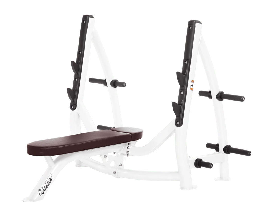 Hoist white burgundy commercial Olympic flat bench with built-in weight plate storage and barbell rack for strength training
