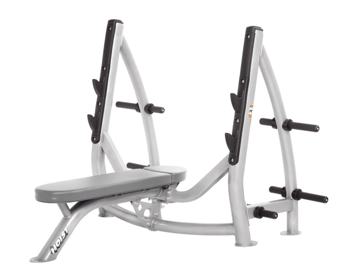 Hoist platinum dove grey commercial Olympic flat bench with built-in weight plate storage and barbell rack for strength training