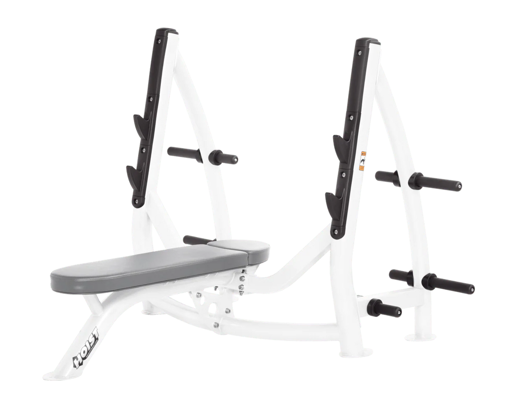 Hoist white dove grey commercial Olympic flat bench with built-in weight plate storage and barbell rack for strength training