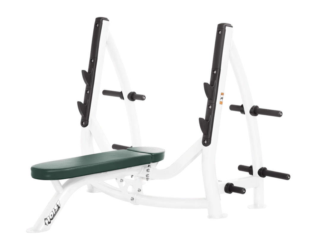 Hoist white hunter green commercial Olympic flat bench with built-in weight plate storage and barbell rack for strength training