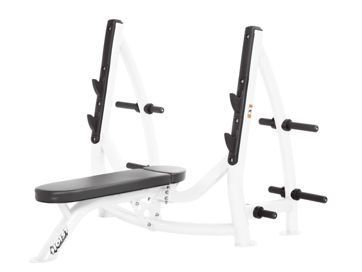 Hoist white slate grey commercial Olympic flat bench with built-in weight plate storage and barbell rack for strength training
