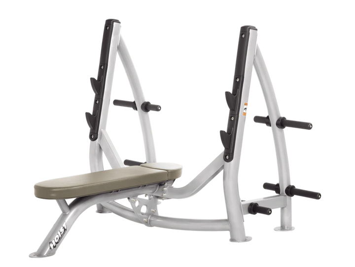 Hoist platinum suede commercial Olympic flat bench with built-in weight plate storage and barbell rack for strength training