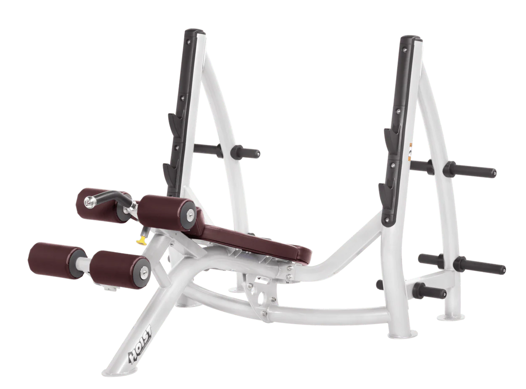 Hoist commercial Olympic decline white burgundy bench with barbell rack and integrated weight plate storage for lower chest training
