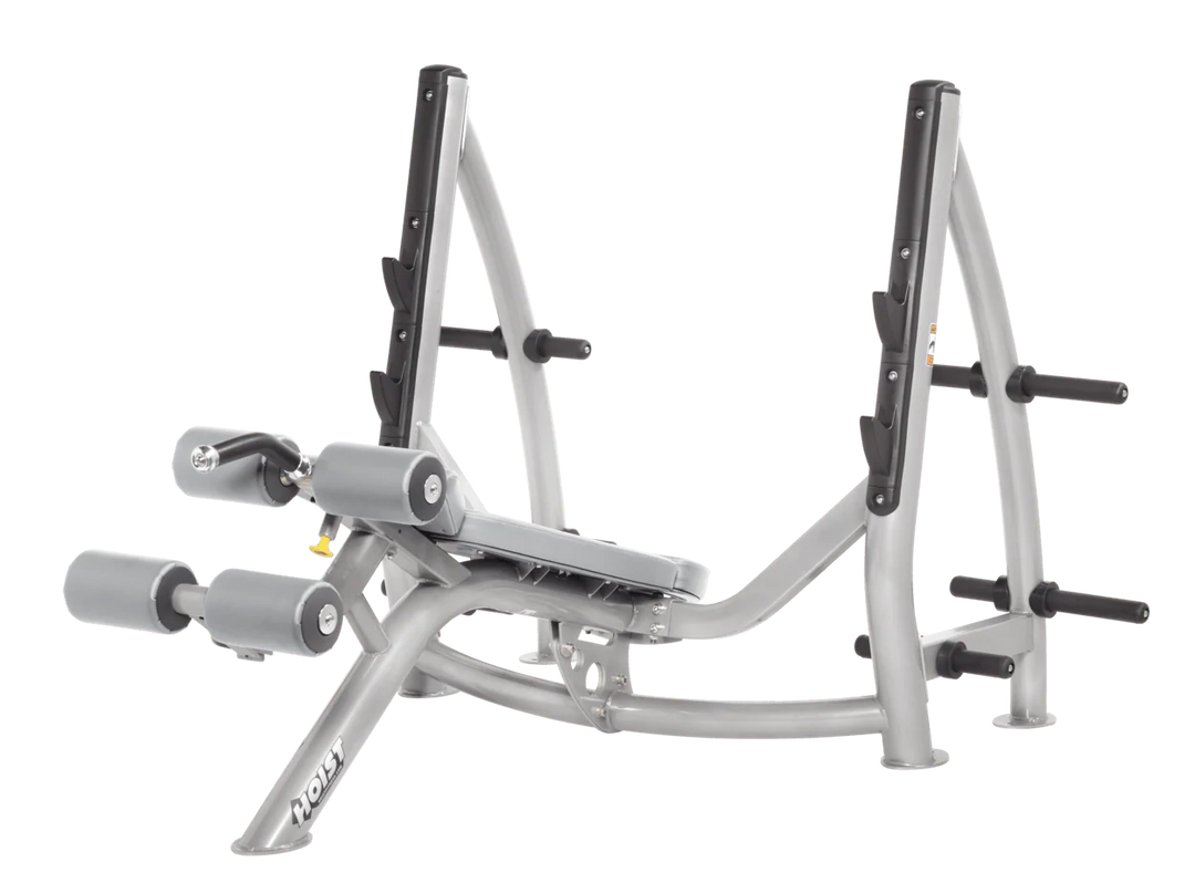 Hoist commercial Olympic decline platinum dove grey bench with barbell rack and integrated weight plate storage for lower chest training