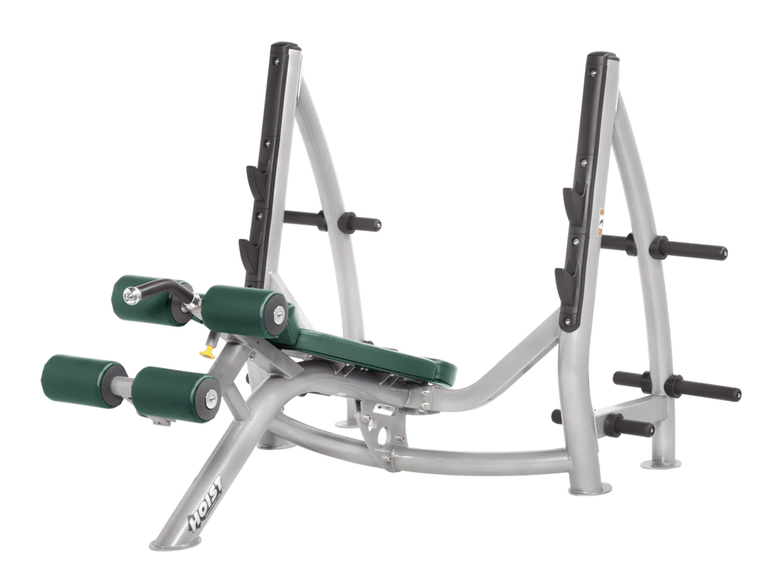 Hoist commercial Olympic decline platinum hunter green bench with barbell rack and integrated weight plate storage for lower chest training