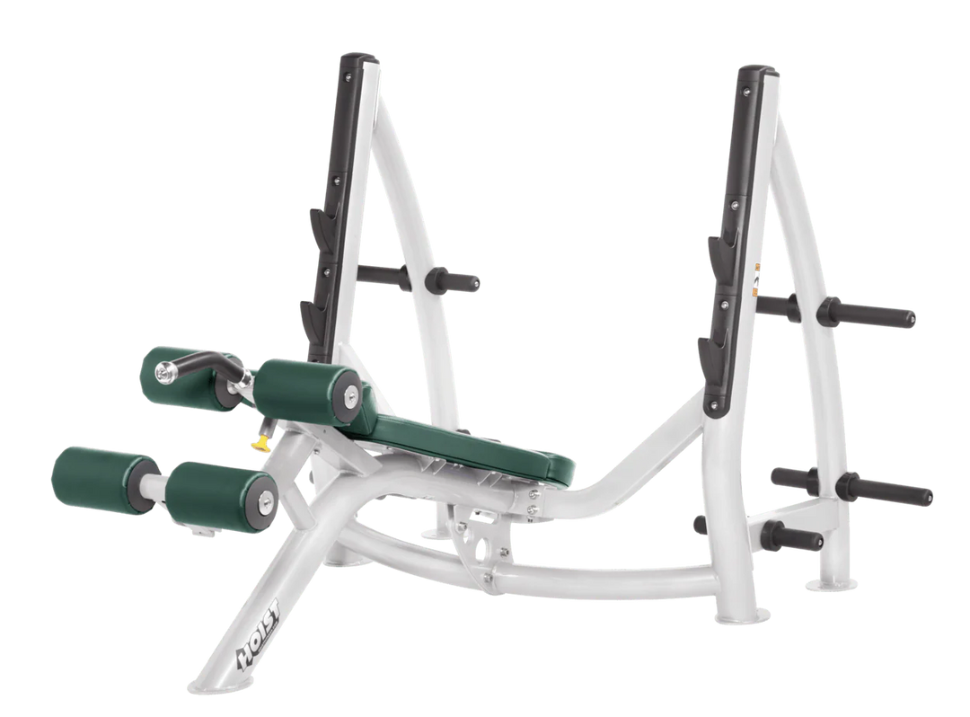 Hoist commercial Olympic decline white hunter green bench with barbell rack and integrated weight plate storage for lower chest training