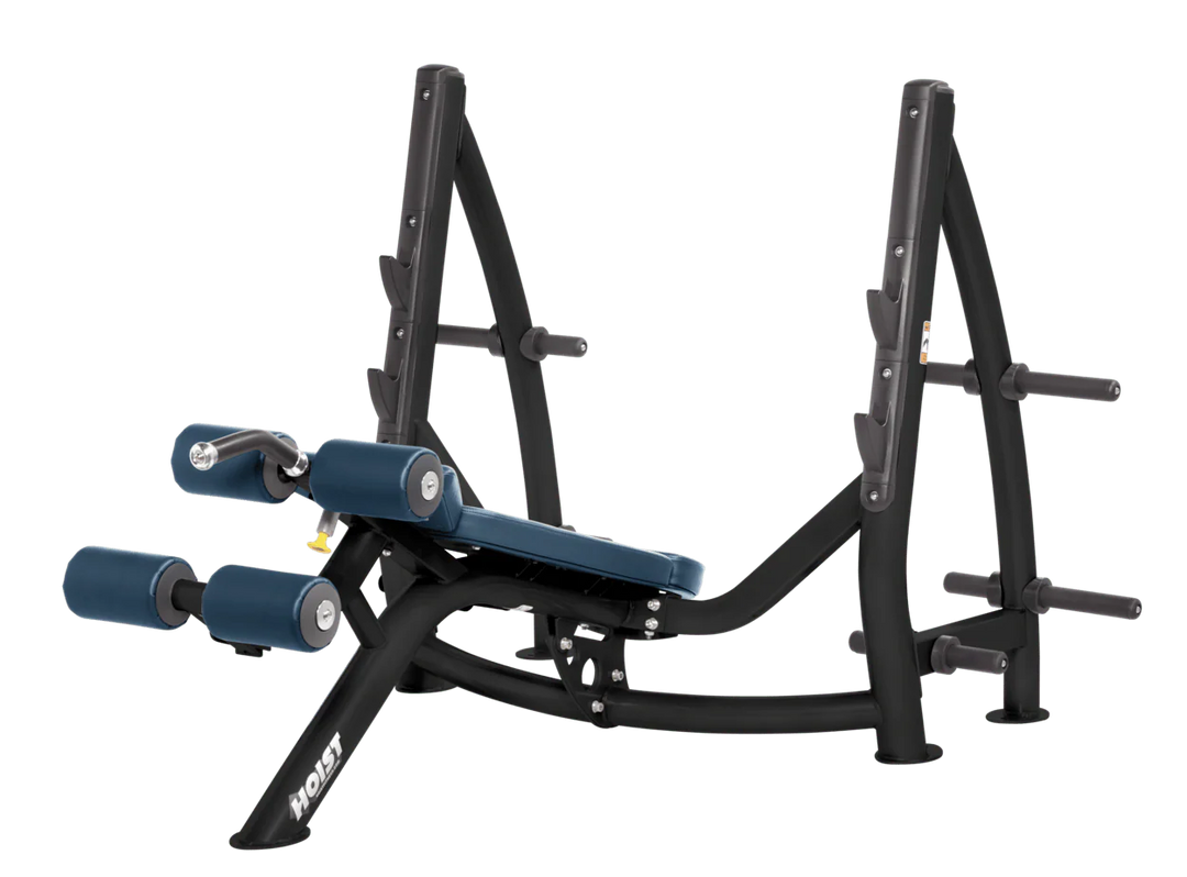 Hoist commercial Olympic decline navy blue bench with barbell rack and integrated weight plate storage for lower chest training