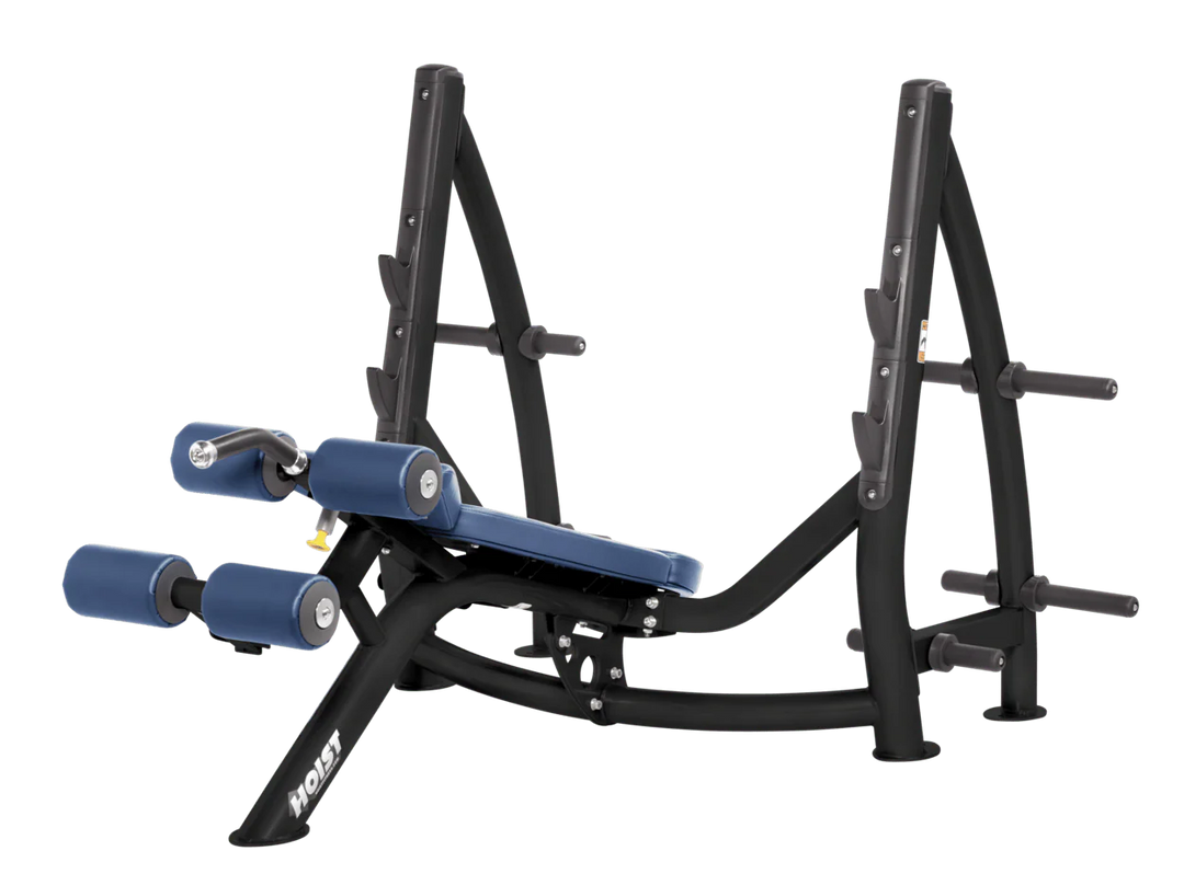 Hoist commercial Olympic decline royal blue bench with barbell rack and integrated weight plate storage for lower chest training