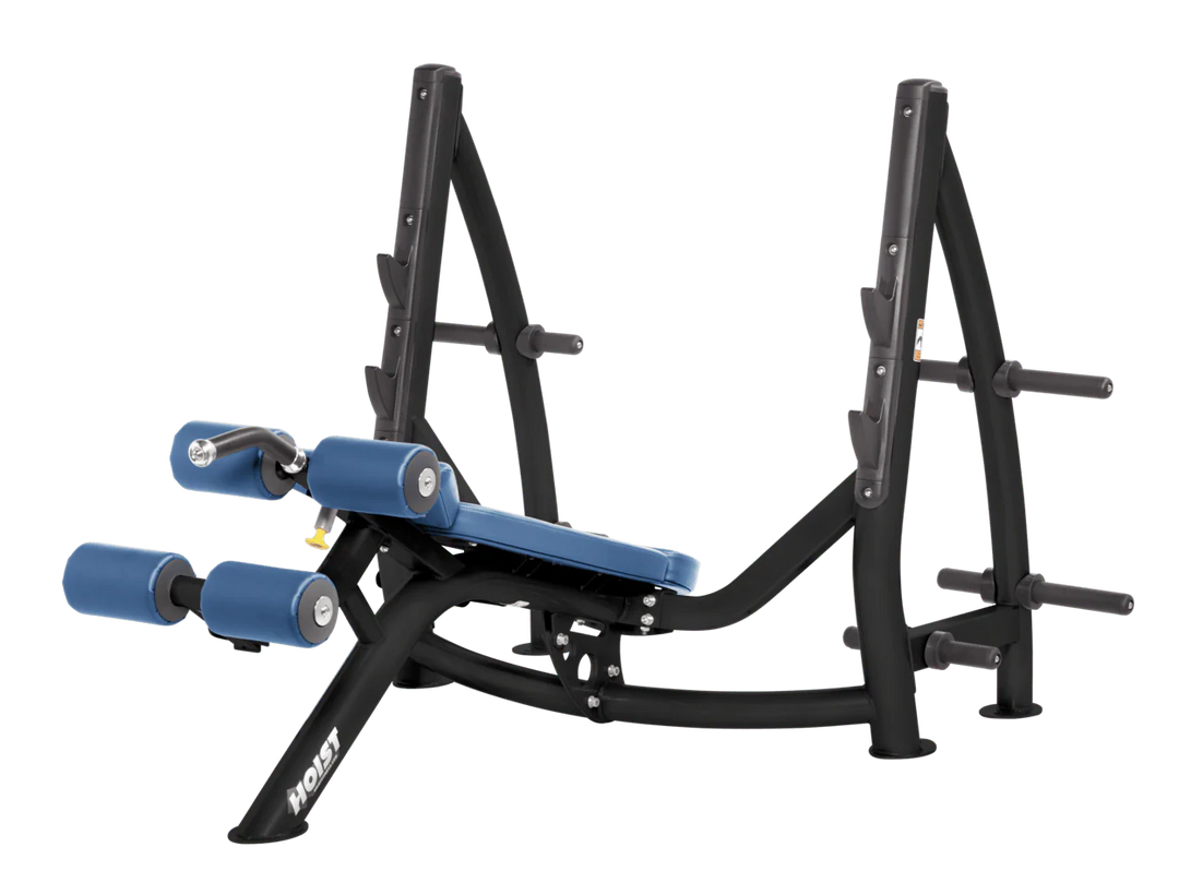 Hoist commercial Olympic decline sky blue bench with barbell rack and integrated weight plate storage for lower chest training